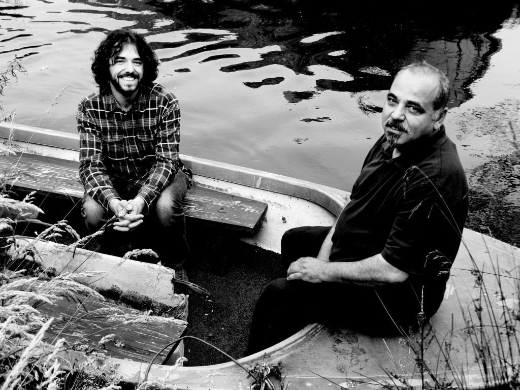 Caspar and his father Serjik in a boat on the Dommel near their house. Photography: Annemarie Haverkamp